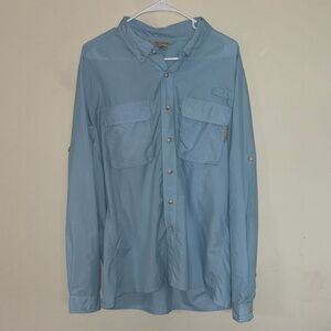 ExOfficio Men's Air Strip Long Sleeve button-down shirt in a light blue color.